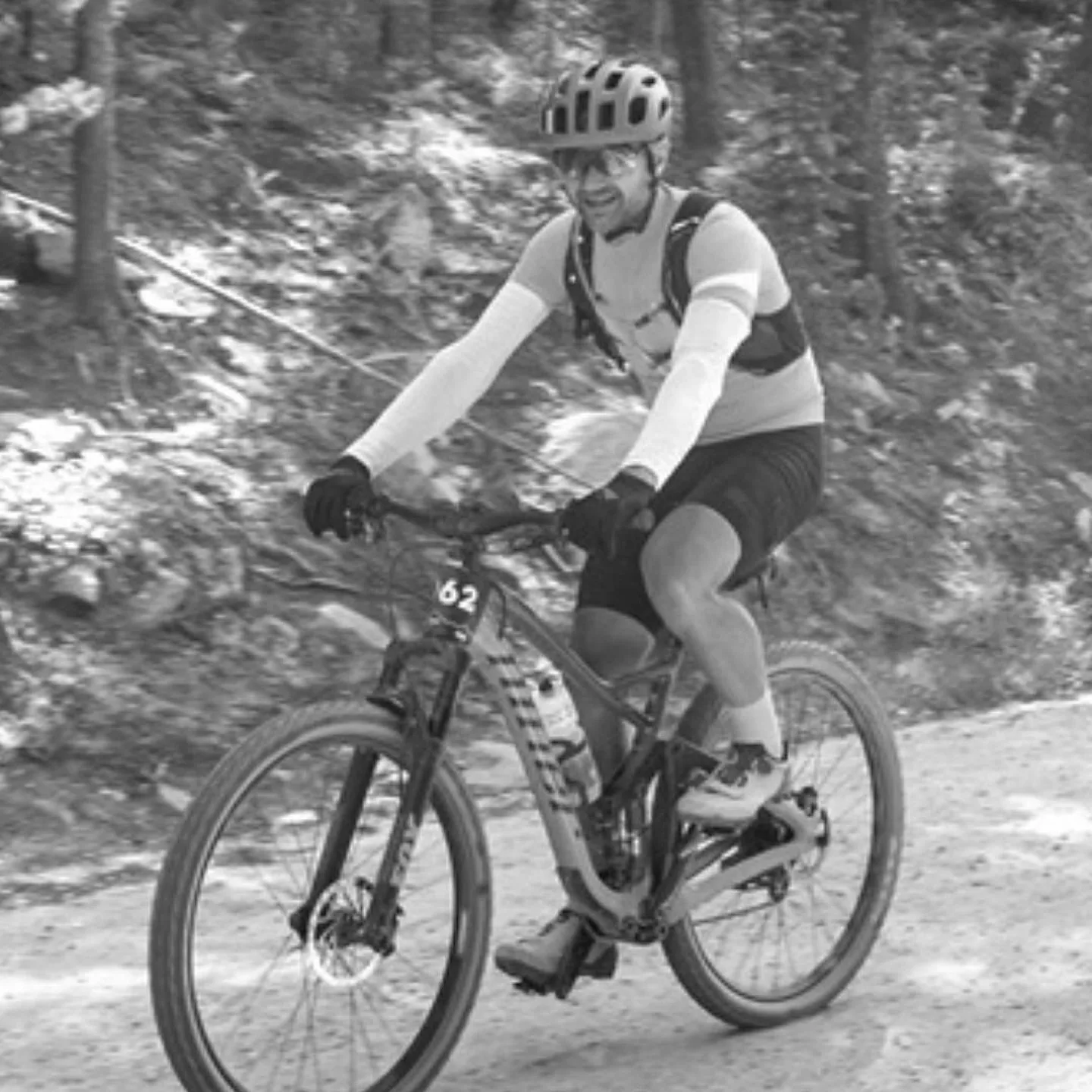 Chad Blakenship riding a mountain bike in the woods.