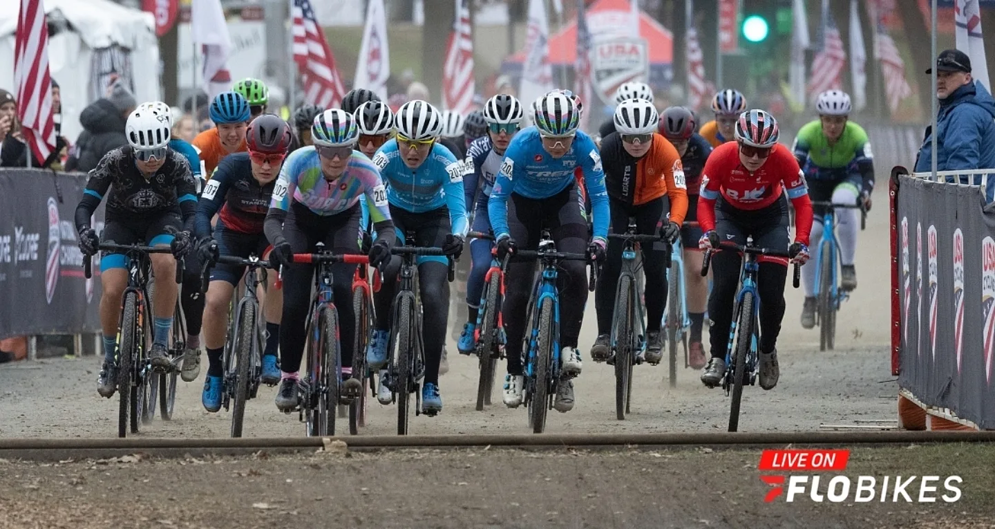 A group of gravel bike racers sprinting for the finish line