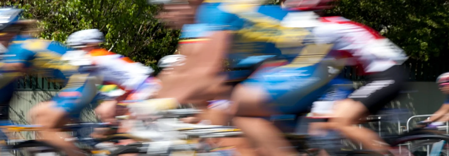 Blurry image of racers mid race.
