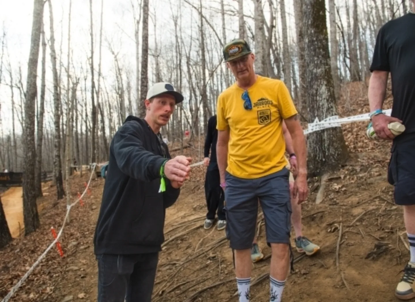 Cyclists walking the course