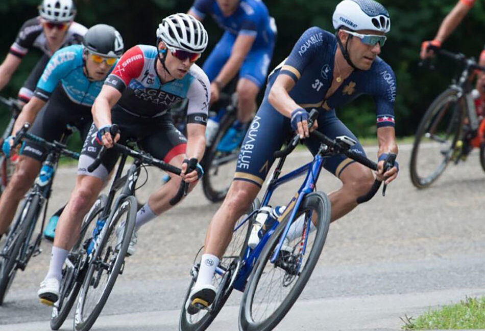 Road racers biking through a corner.